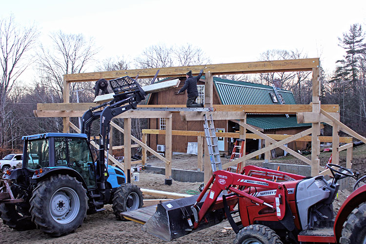Timber frame barn-raising is complete.
