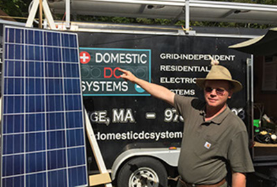 Stefan explaining battery backup systems at the Garlic and Arts Festival in Orange, Massachusetts.